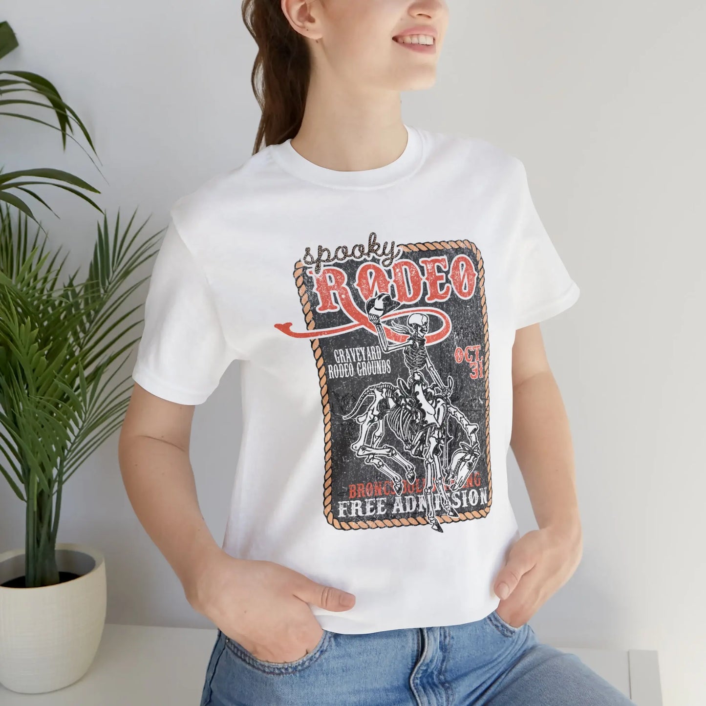 Vintage Halloween Rodeo Poster T shirt Western Spooky Skeleton Short Sleeve Tee Printify